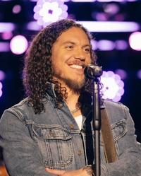 Brandon Lake smiling during a performance