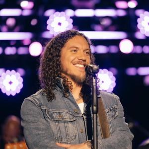 Brandon Lake smiling during a performance