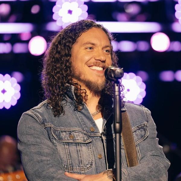 Brandon Lake smiling during a performance