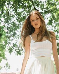 Kelsea Ballerini in a park