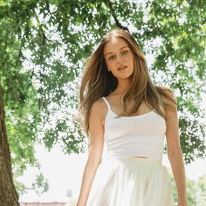 Kelsea Ballerini in a park