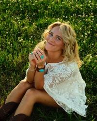 Avery Anna in a field 2026