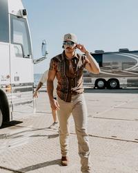 Tucker Wetmore walking off his tour-bus