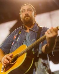 Noah Kahan performing live in 2026