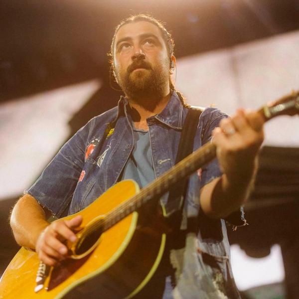 Noah Kahan performing live in 2026
