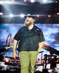 Luke Combs performing in 2026