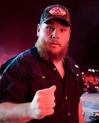 Luke Combs performing in 2026