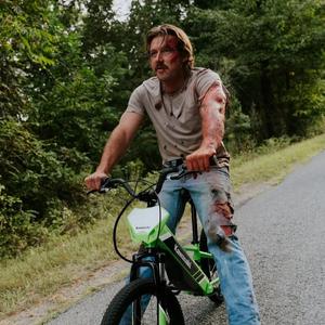 Artist - Morgan Wallen Injured on a Bike