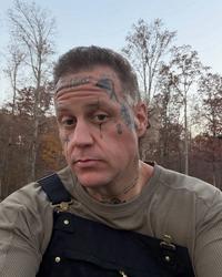 Jelly Roll looking into the camera