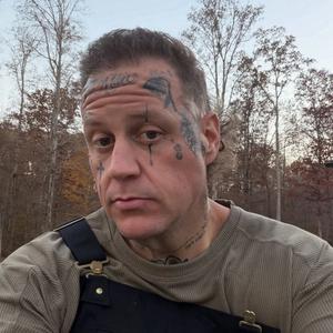 Jelly Roll looking into the camera