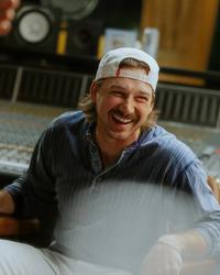 Morgan Wallen smiling in the studio 