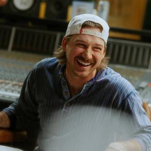 Morgan Wallen smiling in the studio 