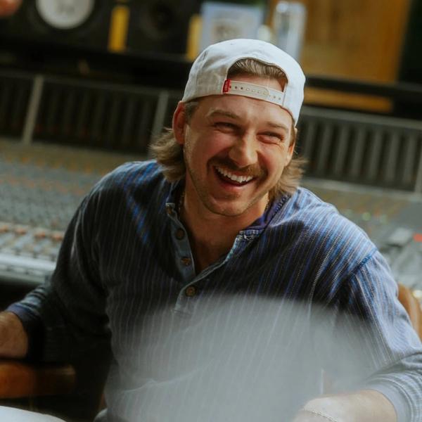 Morgan Wallen smiling in the studio 