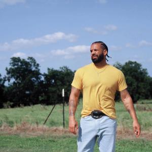 Drake wearing a belt buckle
