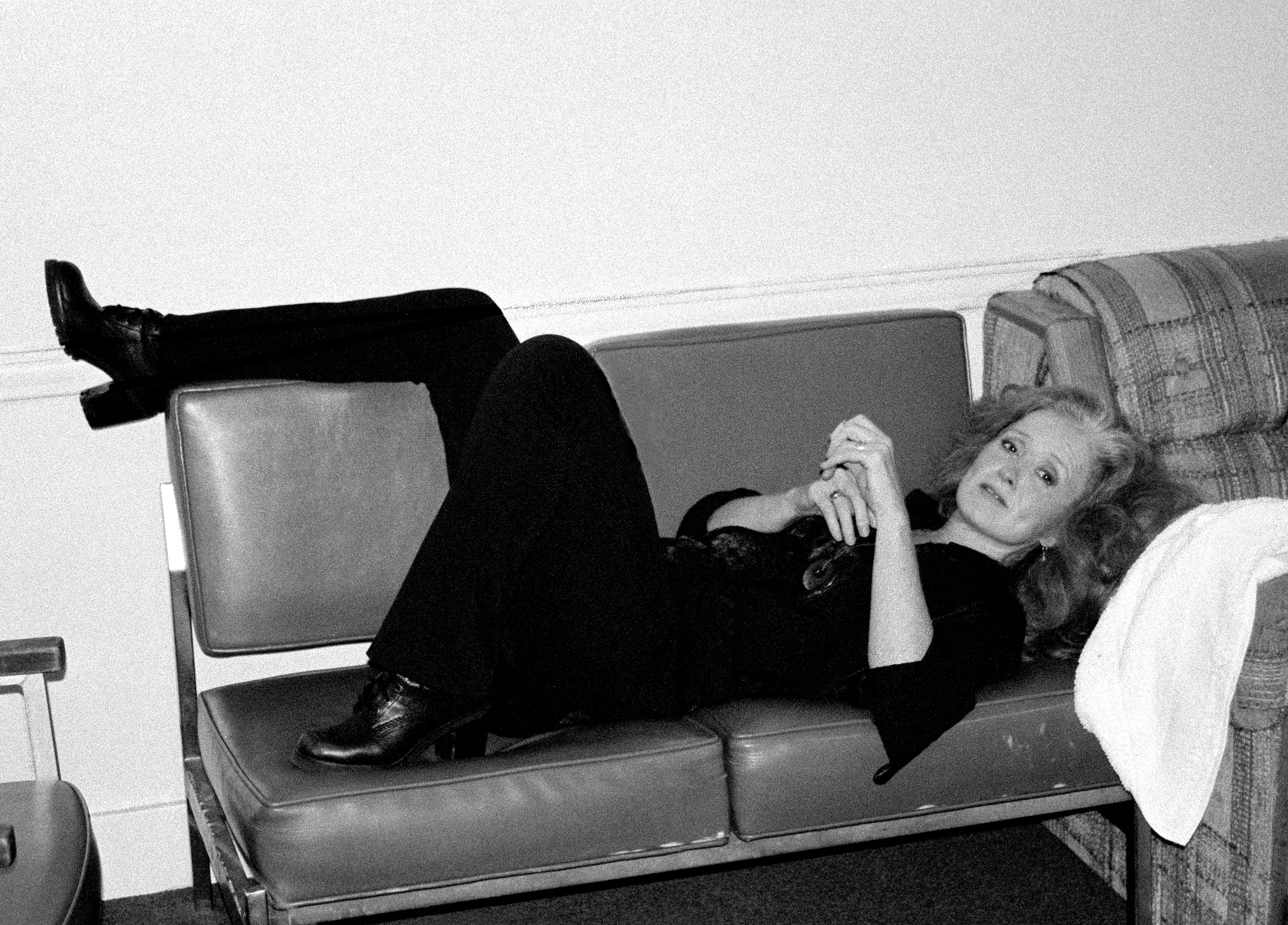 'Bonnie Raitt, 1974. Santa Cruz, California. Bonnie relaxing backstage at The Sierra Club'
