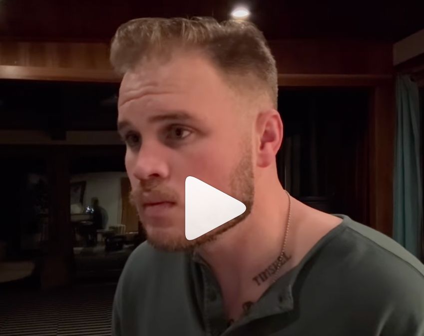 <p>Zach Bryan screenshot of him performing ‘God is a Funny Man’ alongside a piano on Instagram </p>