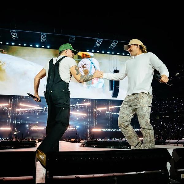Zach John King performing with Morgan Wallen