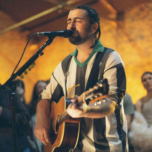 Noah Kahan performing in London in March 2026