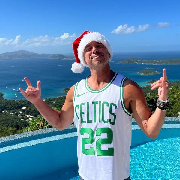 Kenny Chesney wearing a Santa Hat