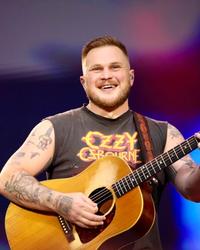 Zach Bryan performing in London in 2026