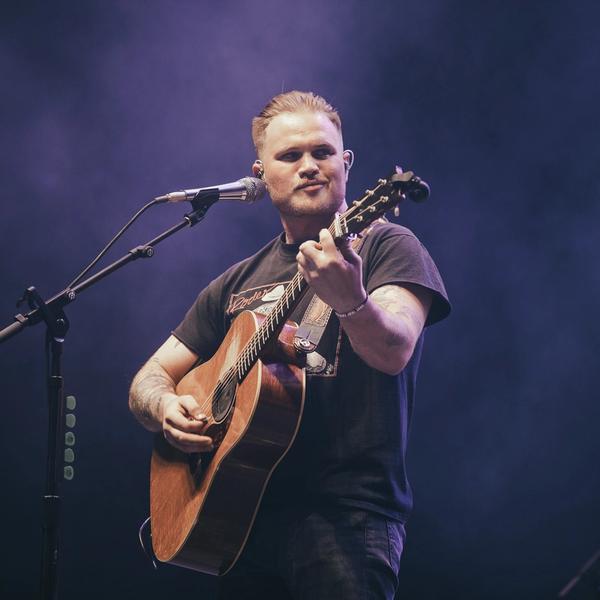 Zach Bryan at Two Step Inn 2023 by Laura Ord