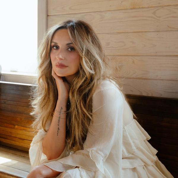 Carly Pearce in a Church pew