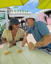 Florida Georgia Line hanging out at the beach bar