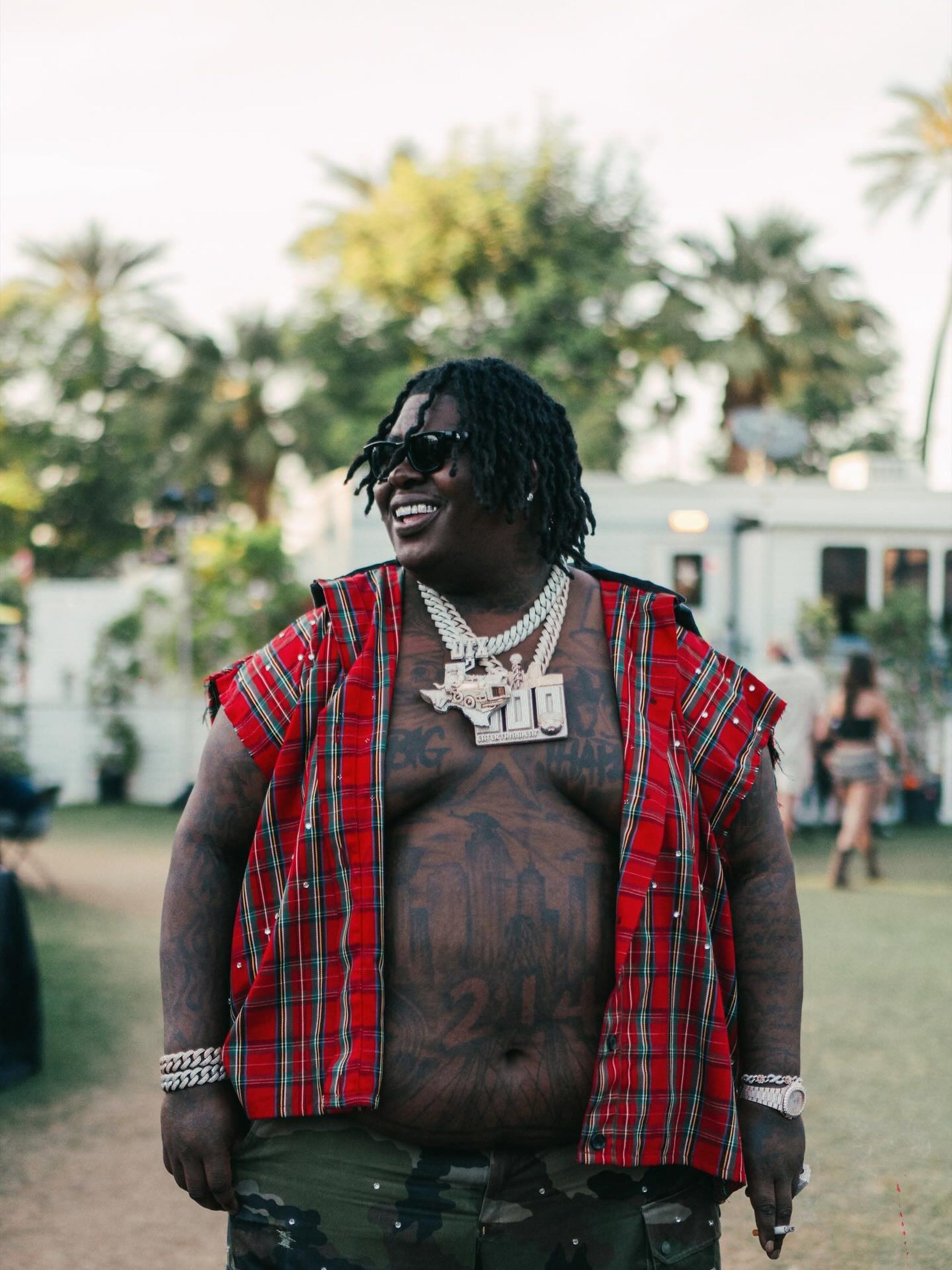 BigXthaPlug wearing a red summer shirt