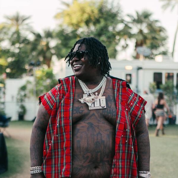 BigXthaPlug wearing a red summer shirt