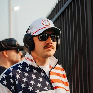 Morgan Wallen wearing a NASCAR USA jacket