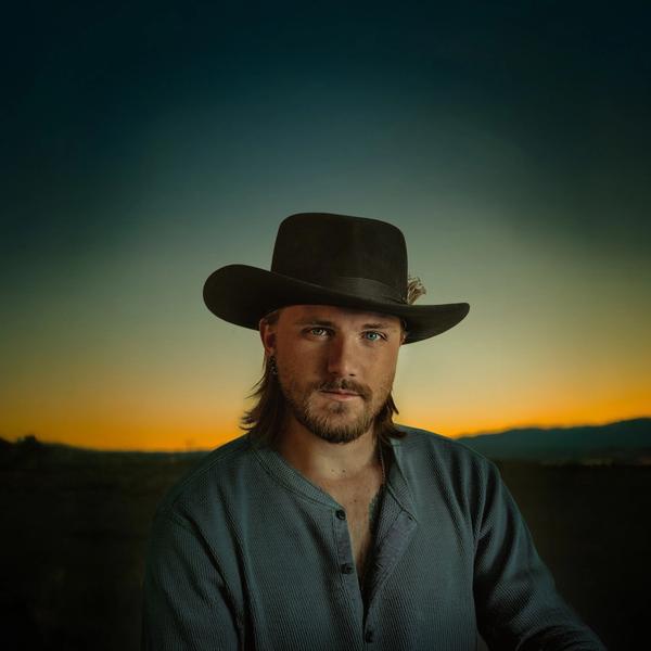 Jackson Dean against a sunset