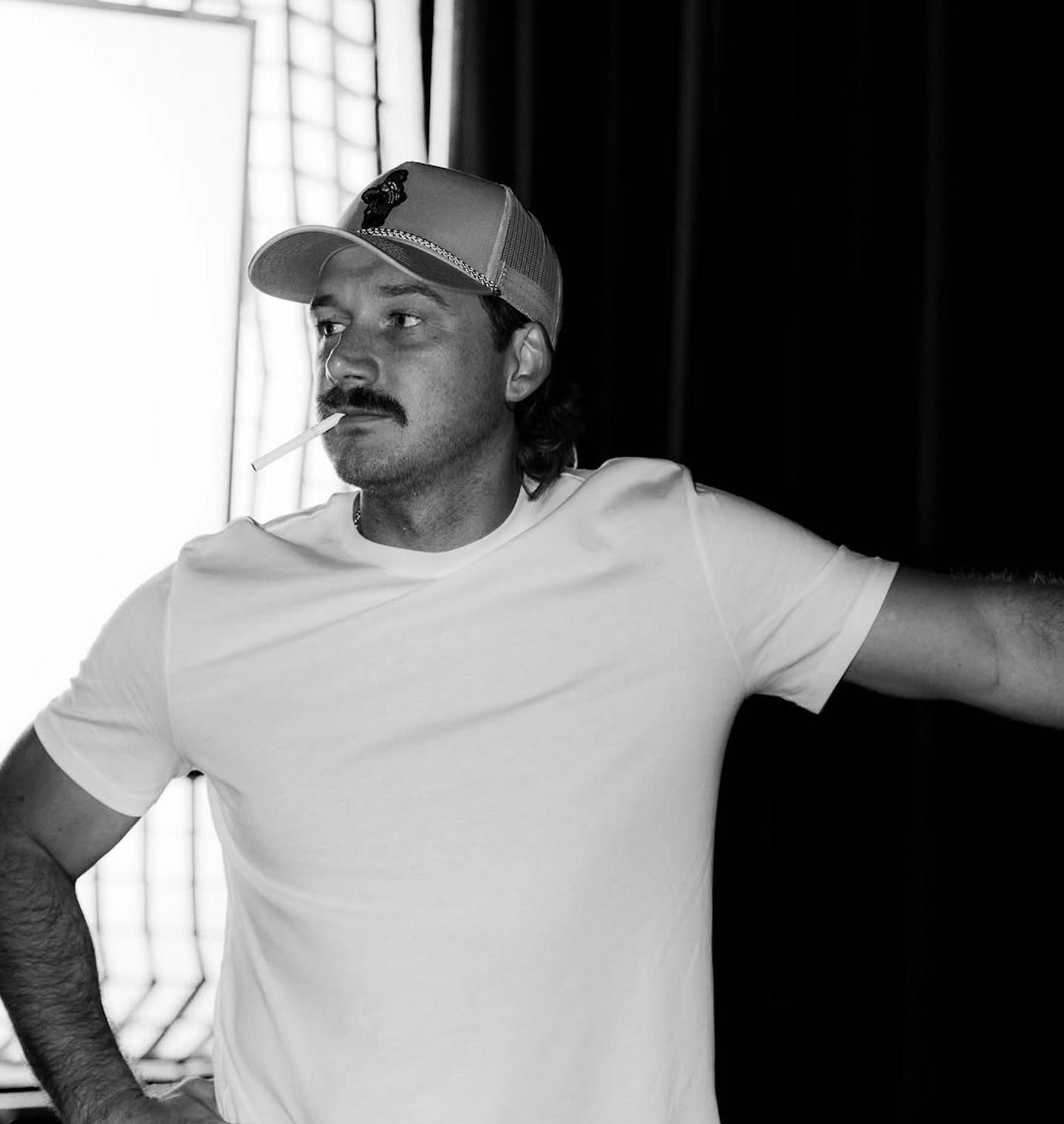 Morgan Wallen smoking a cigarette