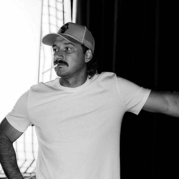 Morgan Wallen smoking a cigarette