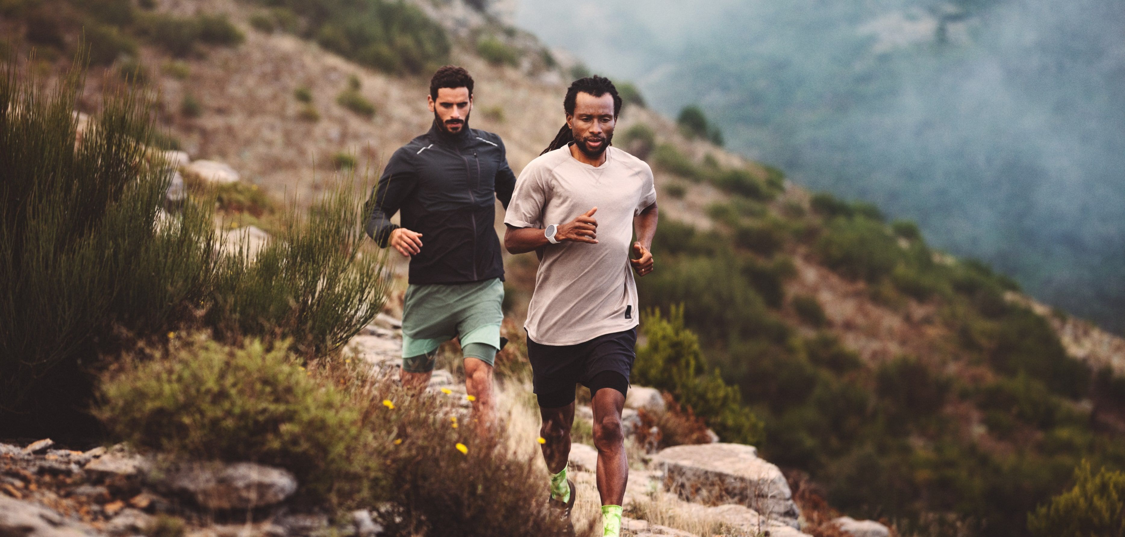 Wide image from H&M Sport's Head into space visual concept for its trailwear collection, set in a vast natural landscape
