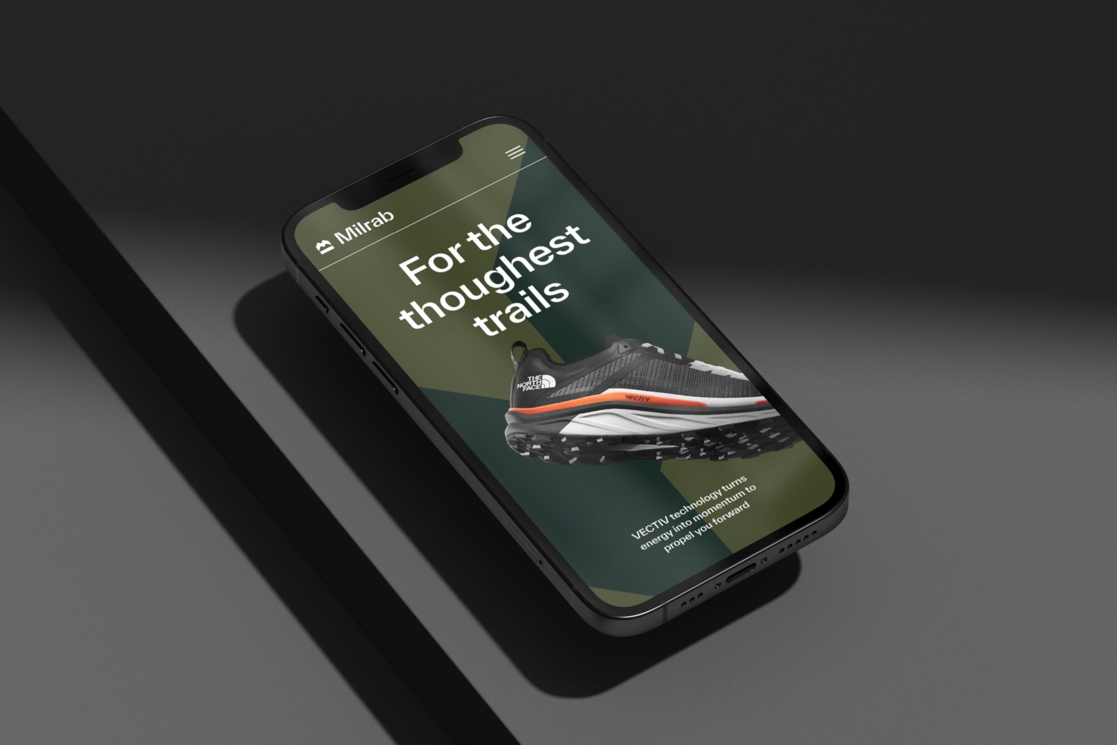 En mockup av Milrabs nettside vist på en mobiltelefon, med den nye identiteten.