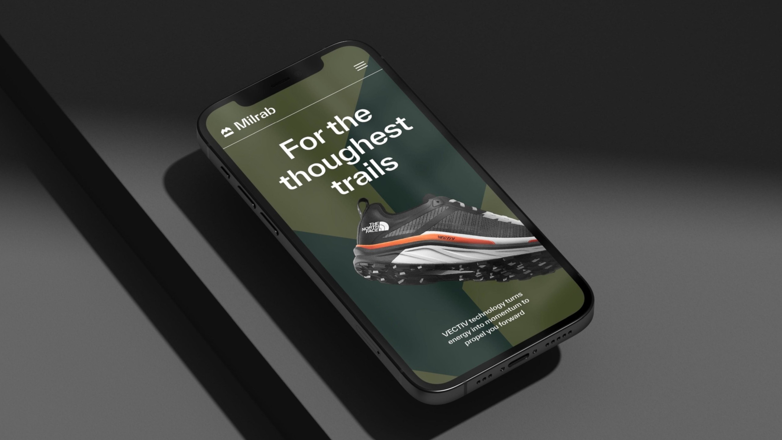 En mockup av Milrabs nettside vist på en mobiltelefon, med den nye identiteten.