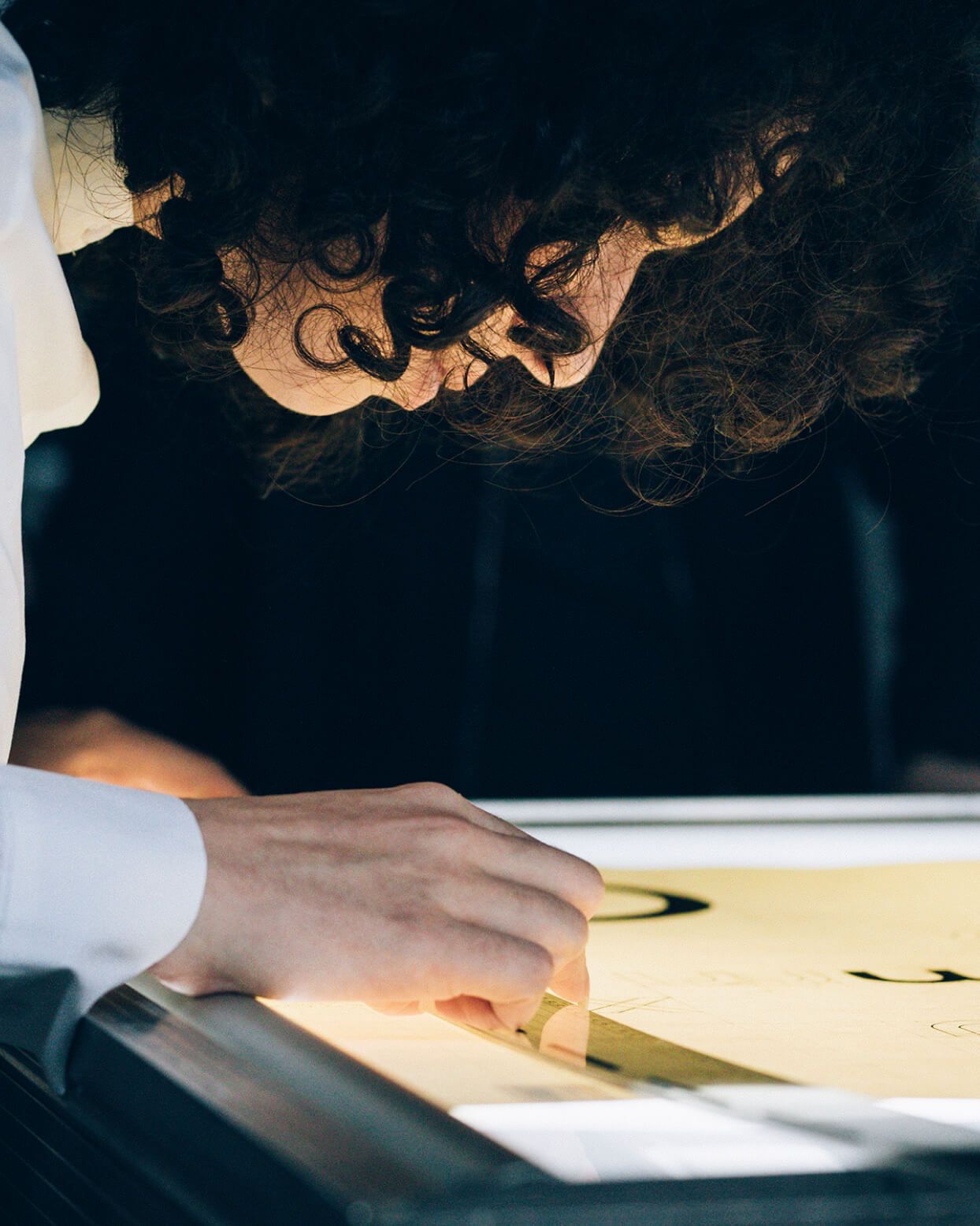 A portrait-format specimen sheet showing character details from a revived Bauhaus typeface.
