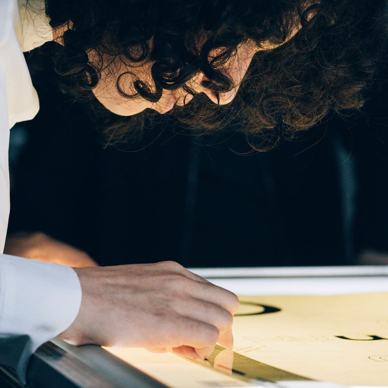 A portrait-format specimen sheet showing character details from a revived Bauhaus typeface.