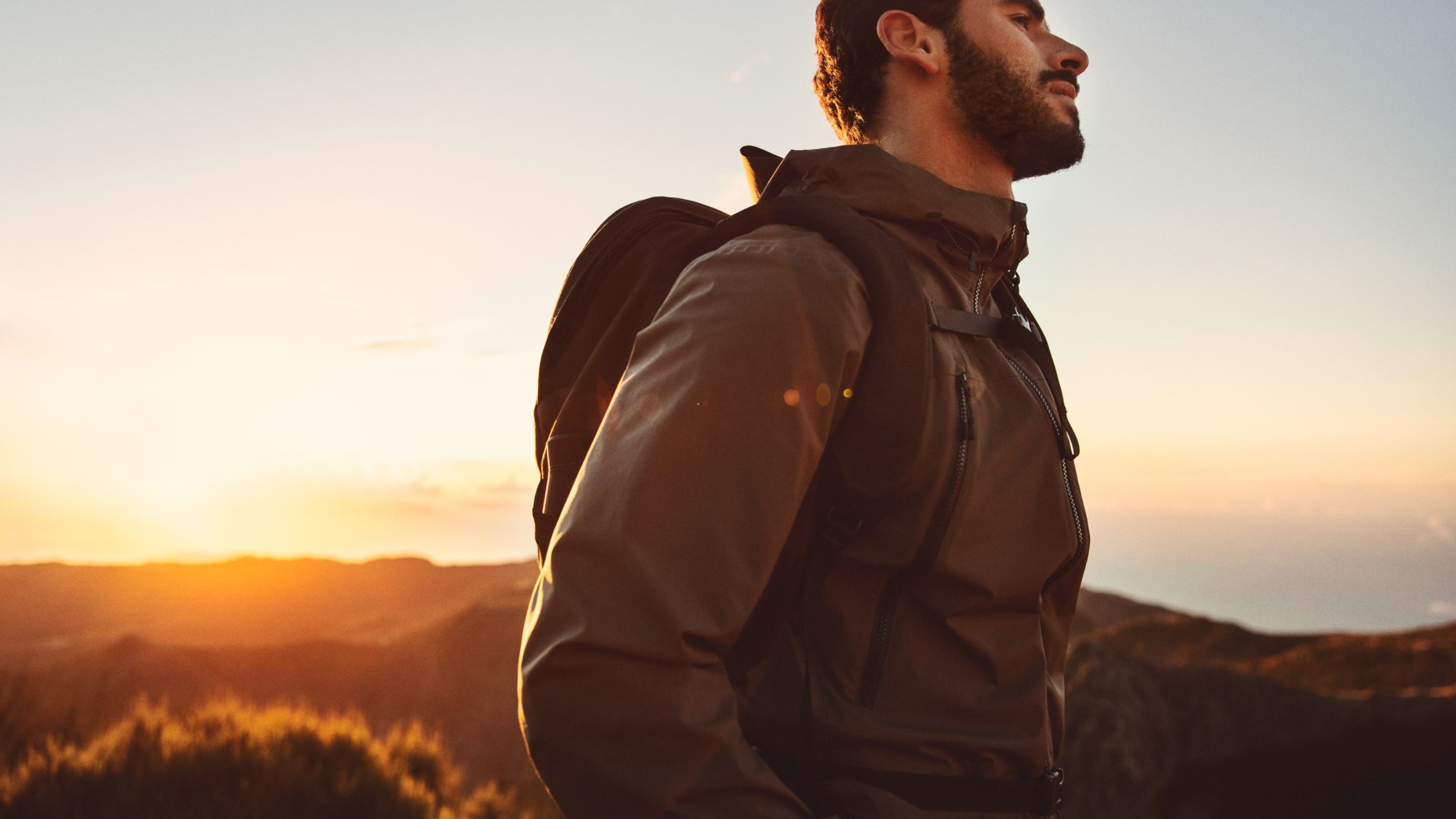Landscape image from the Head into space concept showing H&M trailwear in an open natural setting