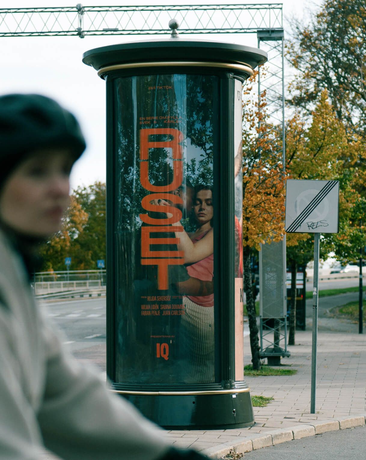 A different photograph of the same five-panel Ruset out-of-home installation on a Stockholm metro station wall.