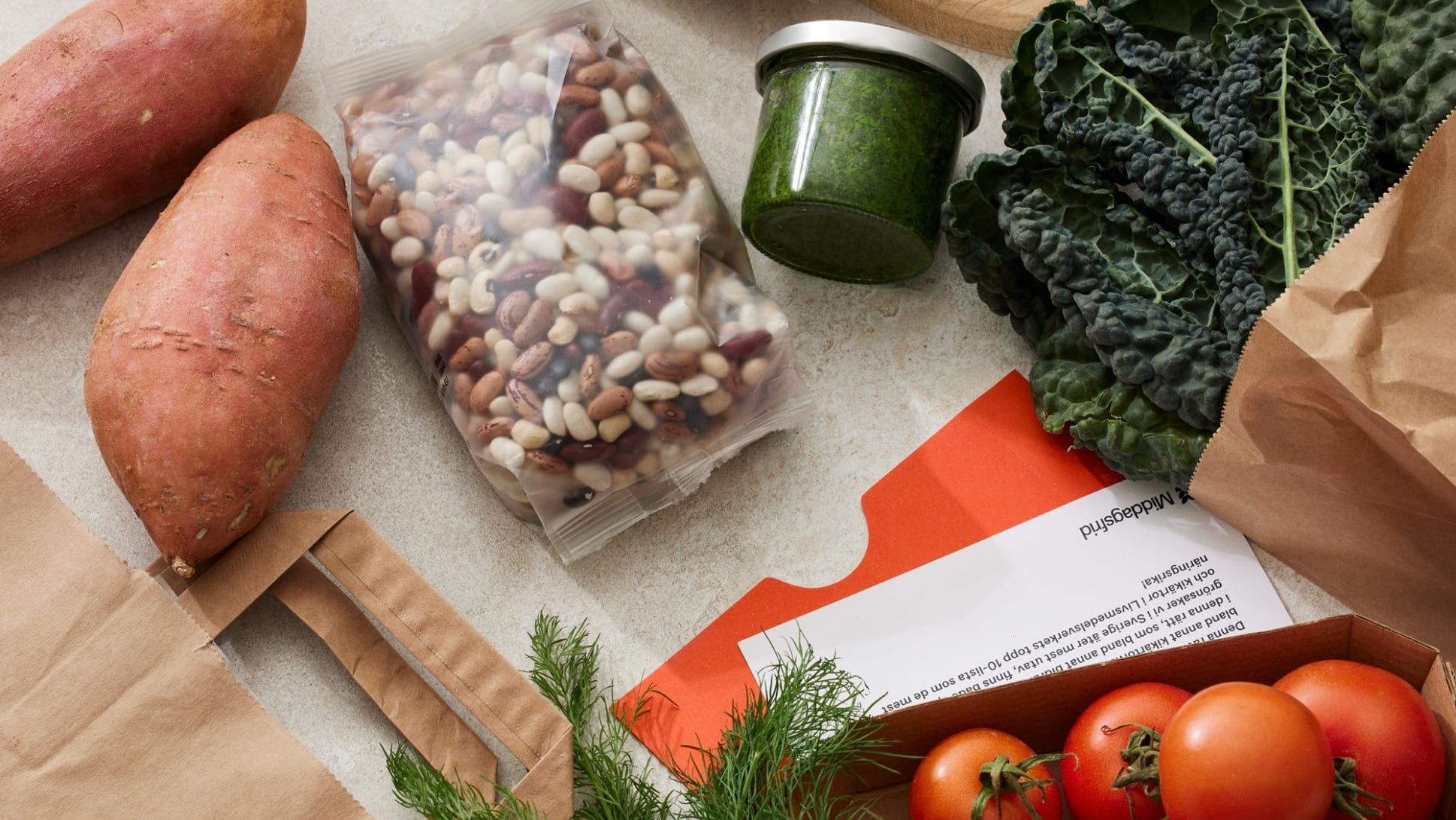 Middagsfrid packaging detail, left of a paired photograph from the rebrand