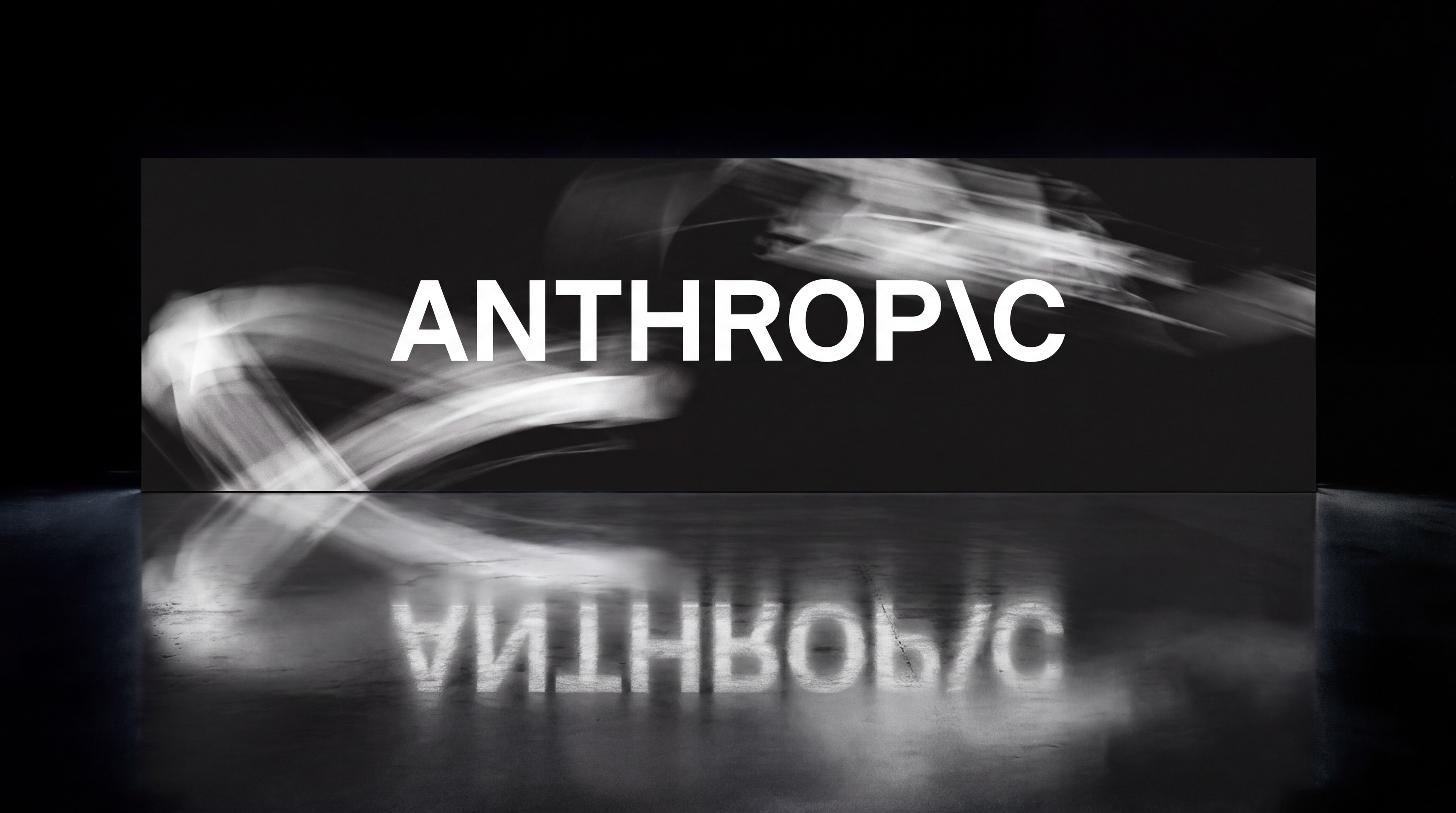 White text "ANTHROP\C" with abstract white light trails on a dark background, reflected on a shiny surface.
