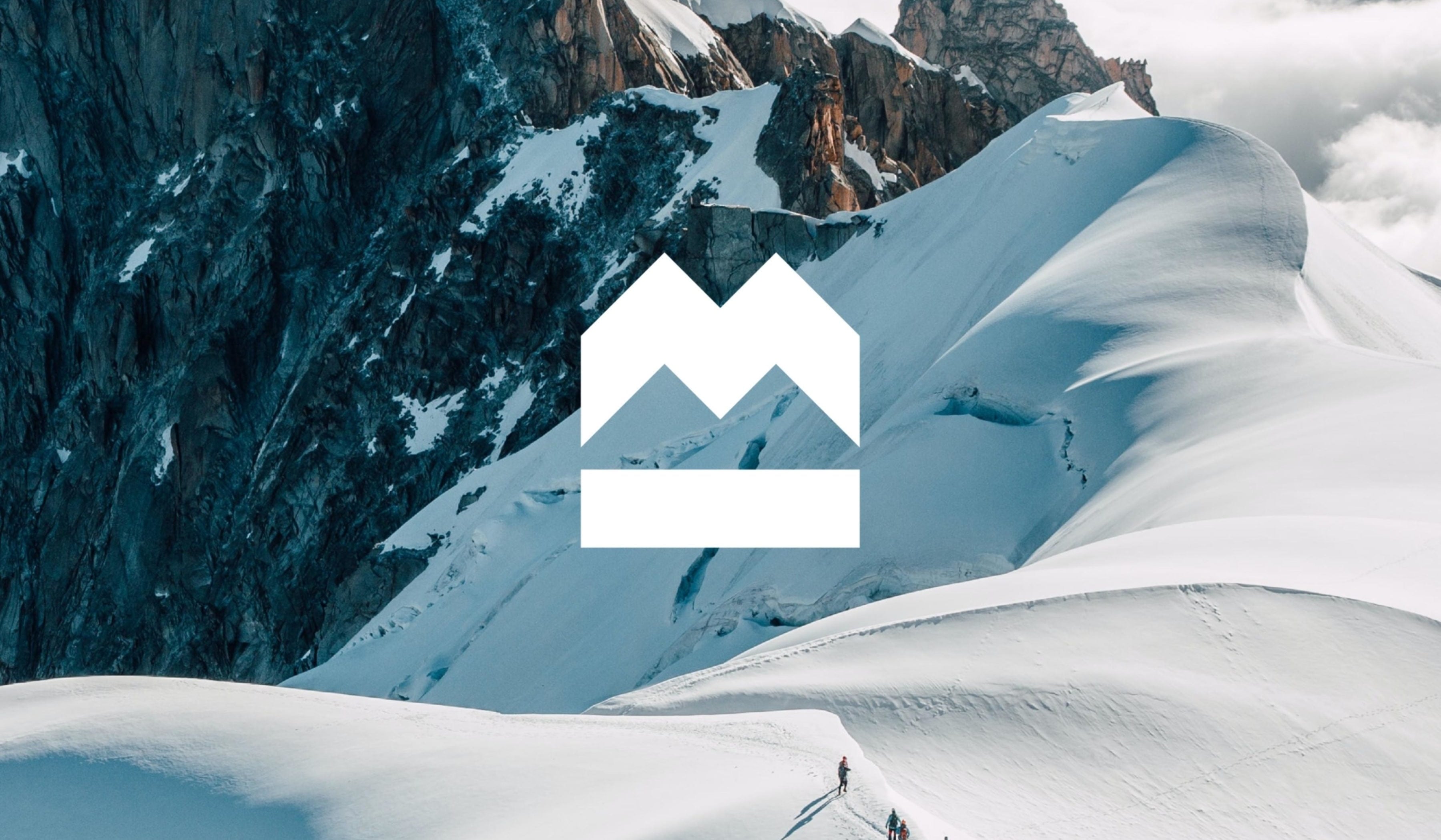 Milrab-logoen vist på en smarttelefonskærm: en minimalistisk M som samtidig kan leses som fjelltopper og en pulslinje.