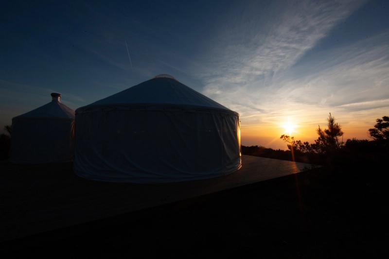 Circular Space yurt at sunset, Azóia — © Denis Chatelain