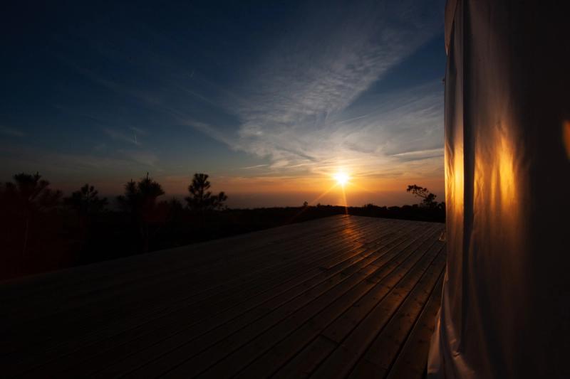 Circular Space terrace at sunset, ocean view — © Denis Chatelain