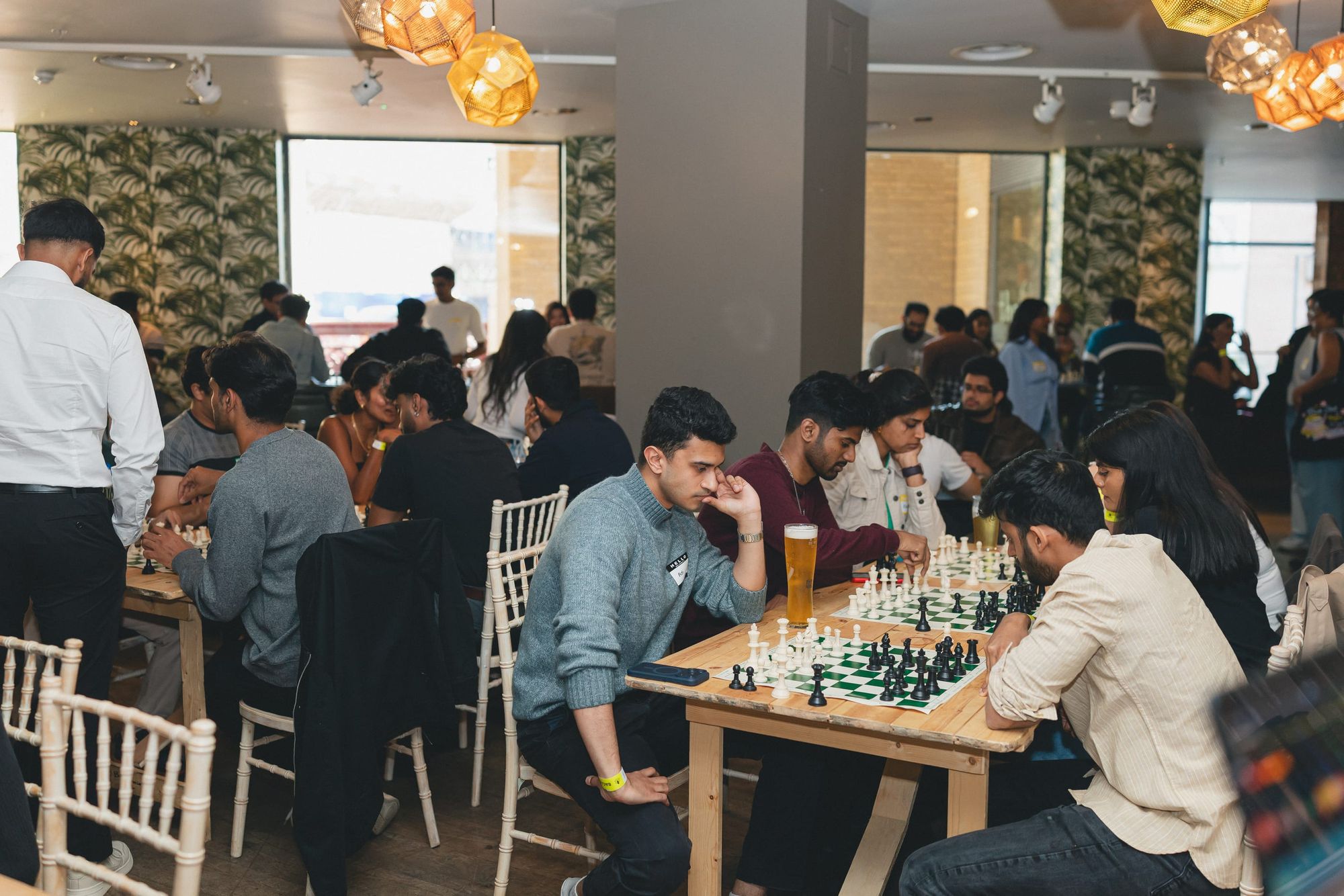 A packed daytime BACA Chess social, every board in play