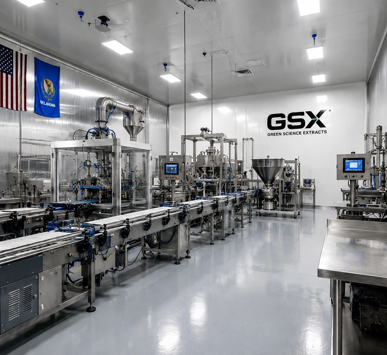 GSX production line with American and Oklahoma flags and the GSX Green Science Extracts wall logo in Chelsea, Oklahoma