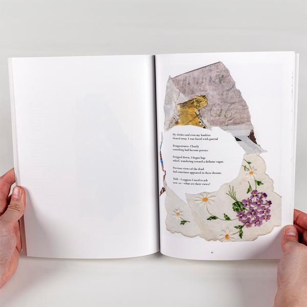 A photo of a person holding a book open. The left side of the page is blank white and the right side of the page has collaged bits of paper and embroidered fabric. In the center there is a typed poem.