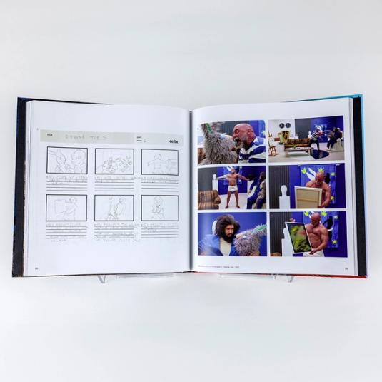 A book spread featuring a drawn storyboard with 6 panels of a scene from Jayson Musson: His History of Art on the left page. On the right page, there are 6 video stills from Jayson Musson: His History of Art that depict the same 6 hand-drawn panels on the left. The storyboard features a story of a buff Picasso interacting with Ollie, a gray, scraggly rabbit puppet in an aggressive manner. They are in Jay's (Jayson Musson's character) living room. We see Picasso throwing Ollie to Jay and then Picasso rips off his clothes and he is left standing in his underwear. Then, we see Picasso painting, but the audience can only see the back side of the canvas. Then, the camera turns to Jay and Ollie who are looking at each other with a confused expression. The camera turns back to Picasso and he is holding up a finished abstract painting.