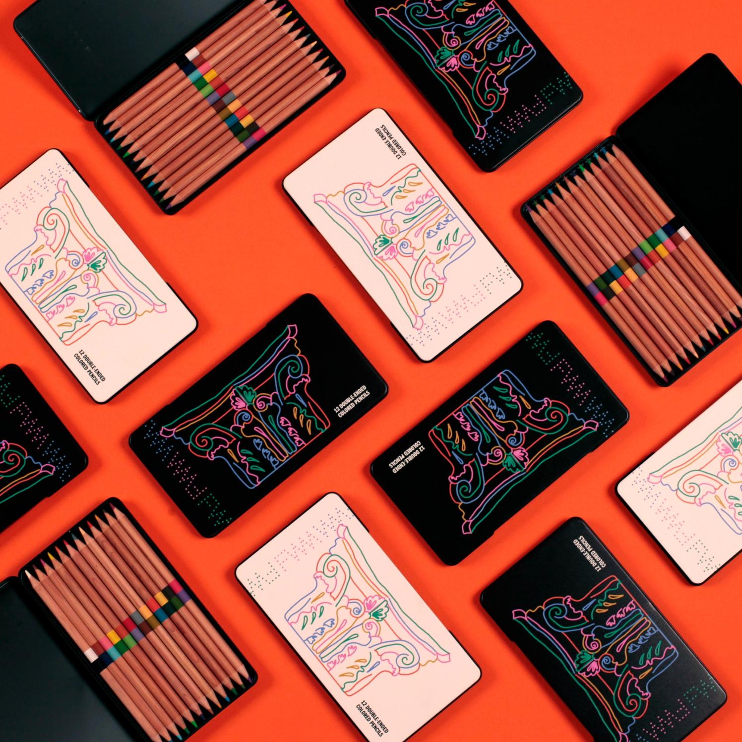 A graphic grid of the pencil cases both in black and cream, with the occasional open pencil case to show the pencils inside against a bright tomato red orange.